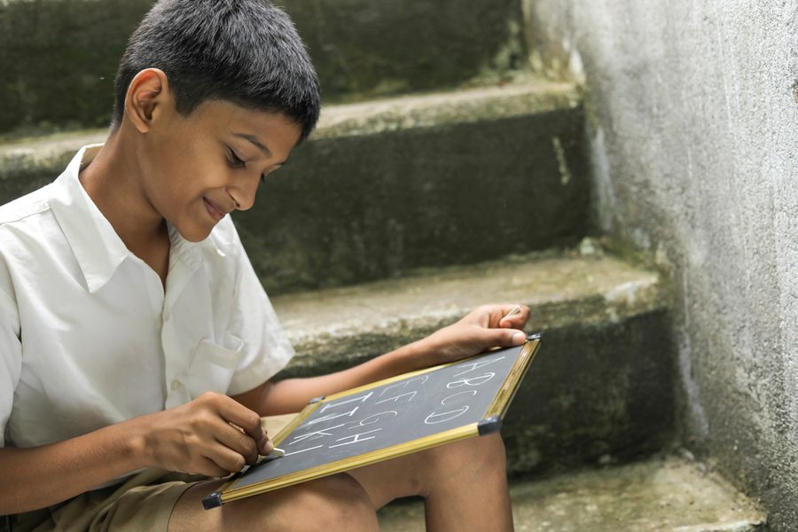 Can a Report Card Capture Curiosity?  Inquiry-Based Assessment through Holistic Progress Card